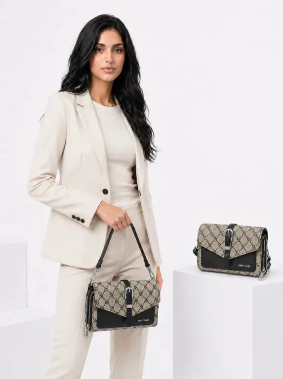 Mică geantă de damă din piele ecologică cu model